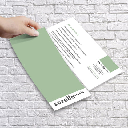 Printed A5 flyers with vibrant graphics and branding